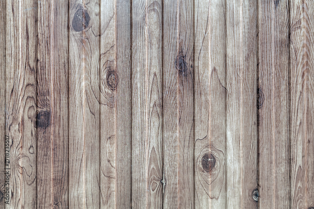 Naklejka premium The image is of a wooden background with a few small wooden pieces
