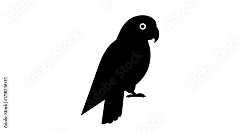 Silhouette of a black owl with bright white eyes perched against a clean white backdrop
