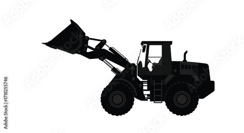 Silhouette of a heavy duty front end wheel loader machine