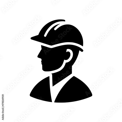 Silhouette of a construction worker wearing a safety helmet. A symbol of hard work and dedication in the construction industry