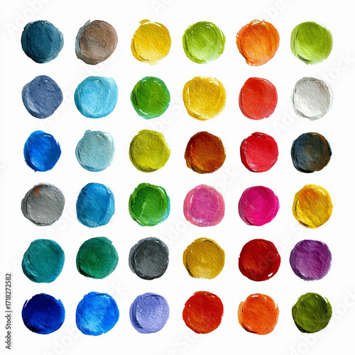 A collection of different multi-colored circles painted with paints isolated on a white background