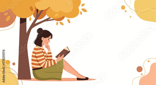 Young Woman Lost In A Book While Enjoying Peace Under A Shaded Autumn Tree