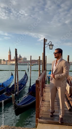 Handsome man in Venice, Italy, stylish casual outfit, walking along canals, soft natural light, cinematic photography, high resolution