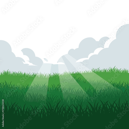 Sunlight streams through clouds onto a vibrant green grassy field, creating a serene and hopeful natural landscape.