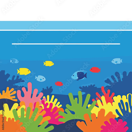 Vibrant coral reef scene with colorful fish swimming.