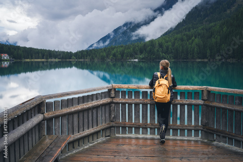 Woman with yellow backpack ...