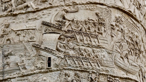 Rome, Italy - 11 January 2025. Trajan’s Column features troops traveling by boat using gangways, depicting organized river transport during a military campaign.