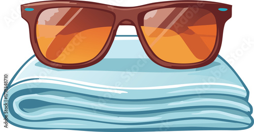 Stylish Sunglasses Resting on a Folded Beach Towel