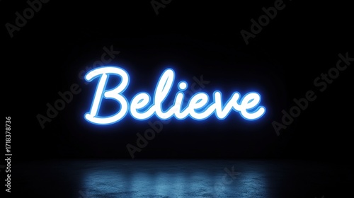 Illuminated Believe sign glows softly against a dark background, inspiring a sense of hope. Stock Image.
