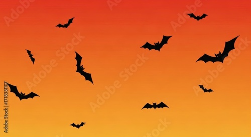 Spooky Halloween night sky with bats silhouettes flying on orange and red gradient background for festive designs and eerie season celebrations