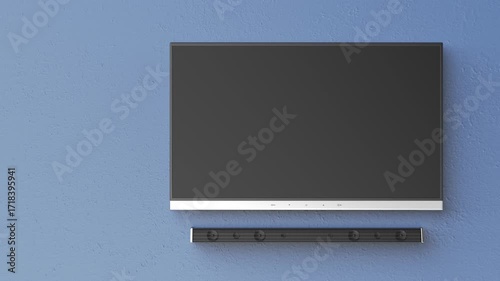 Flat screen TV and soundbar mounted on blue wall