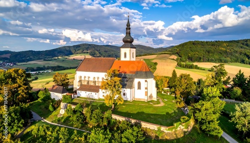 Panoramic view of a church nestled in a valley