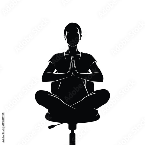 Silhouette of woman meditating and doing yoga in office chair relaxing mindful pose