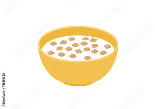 A yellow bowl filled with milk and cereal pieces