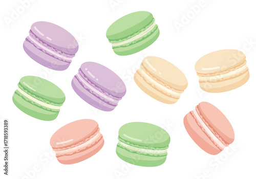 Array of colorful macarons in pastel shades neatly scattered on a white background