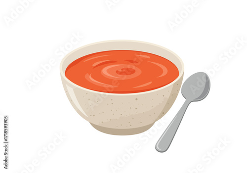 Red soup in a beige speckled bowl next to a silver spoon on a white background