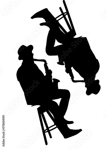silhouette of a man playing a guitar