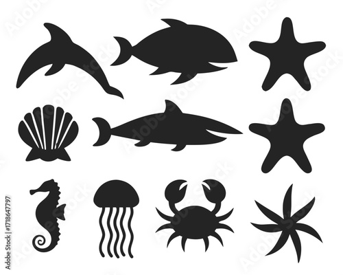 Collection of black silhouettes of marine animals and sea life