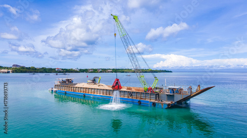 Marine Dredging Barge with Crane Excavating Seabed Soil