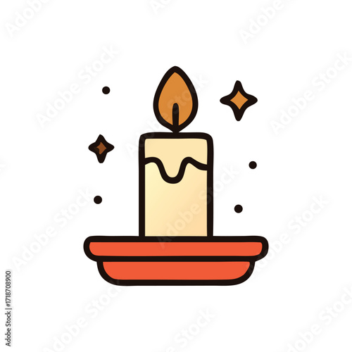 Family traditions sparkle as a burning candle illuminates a red holder during celebrations.