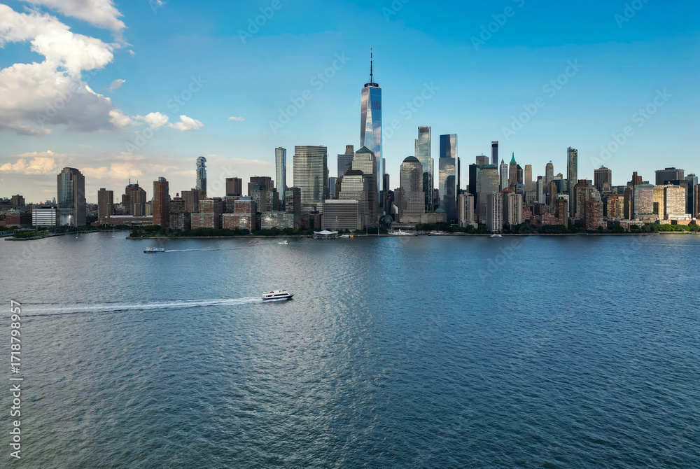 Obraz premium NYC skyline with skyscrapers aerial view. Manhattan and Brooklyn on sky. New York City skyline with Hudson River views. Downtown NYC. New York waterfront skyline. Panorama of of New York from top.