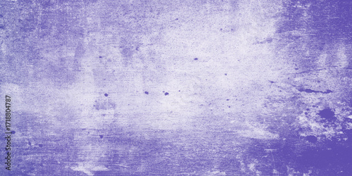 A textured surface with a predominantly purple color scheme, The texture appears rough and weathered, with lighter and darker patches, and a few small dark spots scattered across the surface.