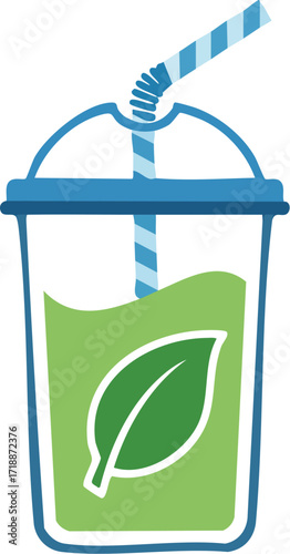Green smoothie in a plastic cup with a blue lid and straw, decorated with a leaf.