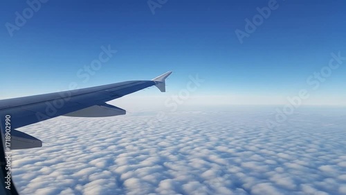 Stunning Aerial View of Clouds from Airplane Window.