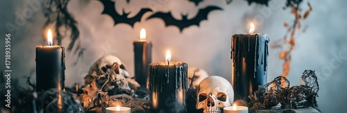 Halloween Decorations With Candles, Skulls, and Bats Creating a Spooky Atmosp...