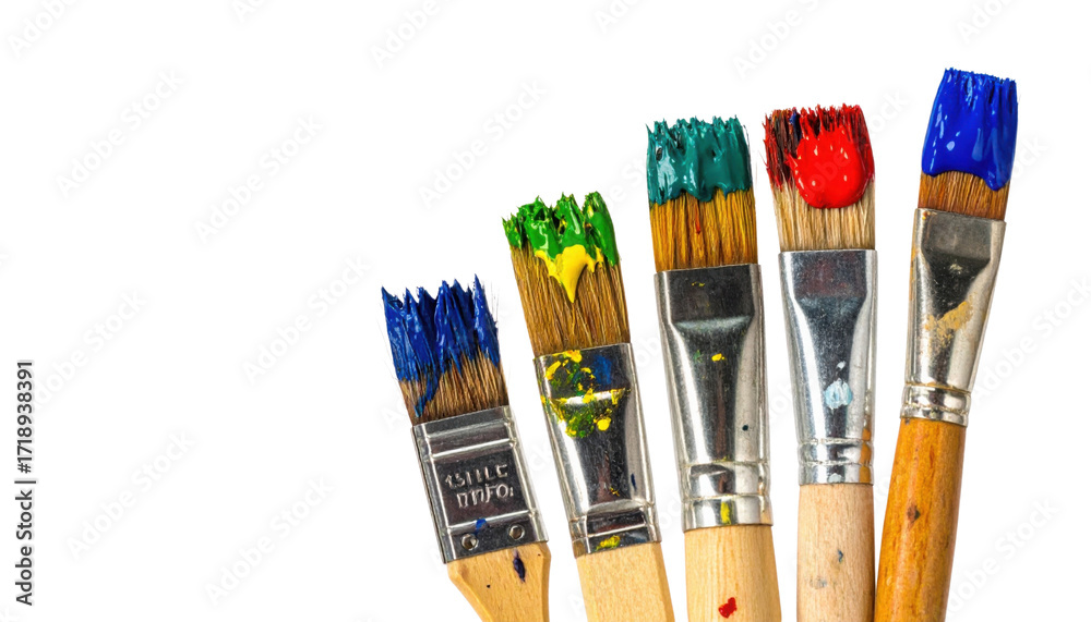 Obraz premium A collection of paintbrushes with vibrant, multicolored bristles showcasing various paint applications.