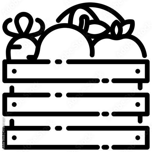 Black and white crate filled with root vegetables.