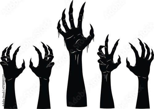 Five spooky black silhouette zombie hands reaching upward for halloween horror concept