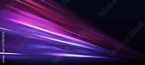 A cascade of glowing neon lines forms a spiraling tunnel of light. The vibrant colors shift between blue, pink, and purple hues. It’s a mesmerizing journey through speed and motion.