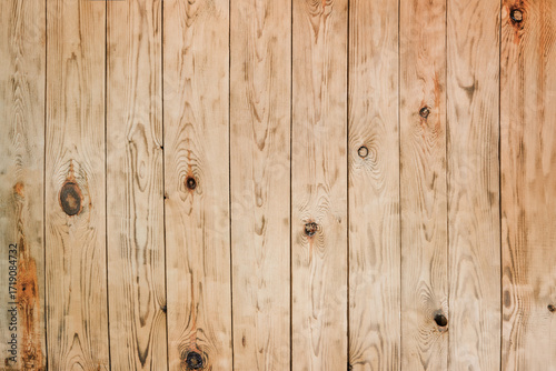 Brown distressed rustic wood grain with twig imperfections and scratches. Overhead view of old dark brown wooden table. Texture or abstract background. Place for text.
