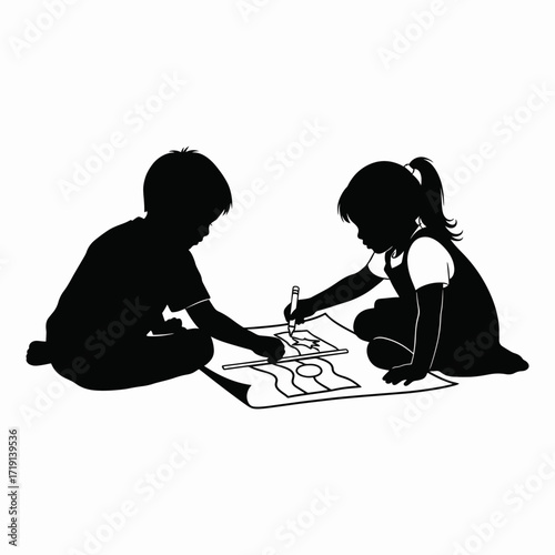 Two young children happily drawing pictures together on paper showing their artistic skills