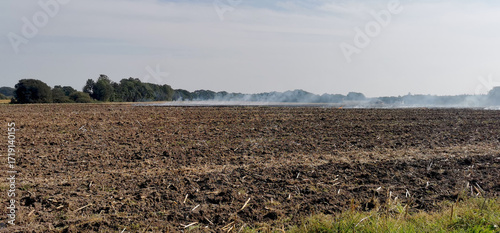 Burning off a Danish agricultural field after harvest with a controlled fire