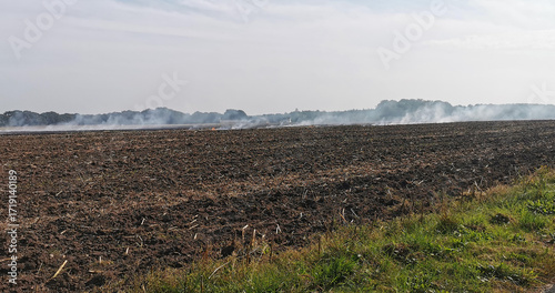 Burning off a Danish agricultural field after harvest with a controlled fire
