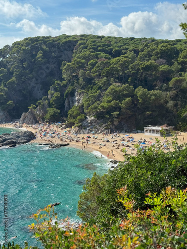 Sunny beach view with blue sea water horizon sandy coastline seascape summer vacation travel tourism ocean waves nature landscape