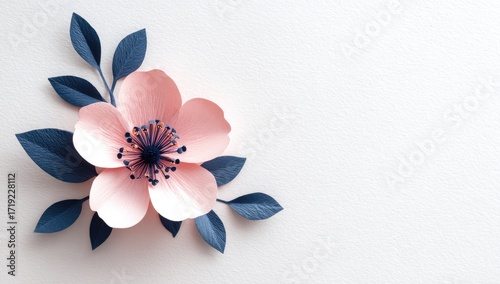Delicate pink paper flower with dark leaves on white background