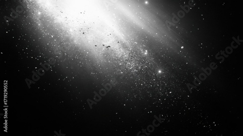 Abstract cosmic background with stars and light rays in black and white.