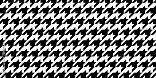 Houndstooth pattern. Dog tooth background. Plaid, scarf or cloth woven fabric print. Pied de poule textile motif. Retro tweed textile design. Classic monochrome ornament. Vector graphic illustration.