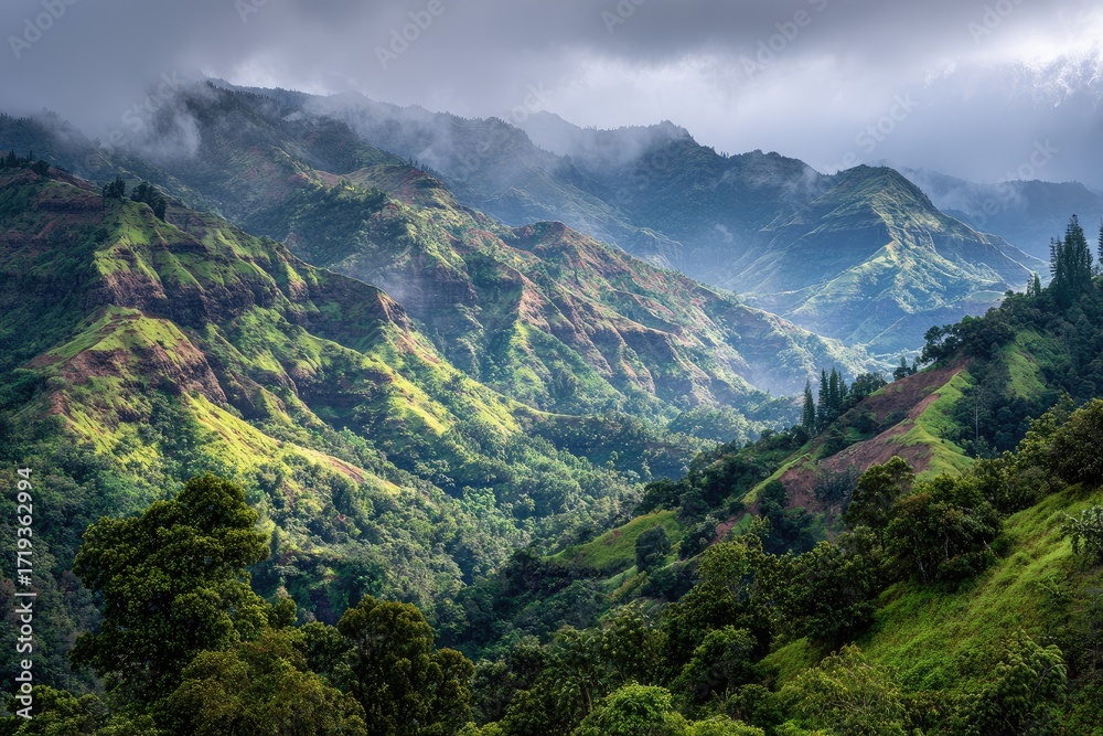 Naklejka premium Lush green mountains, valleys, and clouds