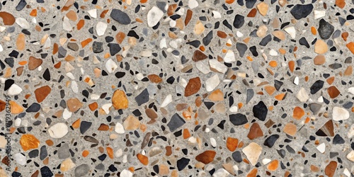 Close up of a terrazzo floor with colorful aggregate chips and cement background