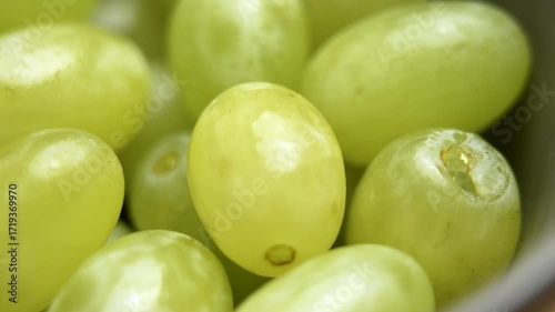 Wallpaper Mural Fresh green seedless grapes in kitchen bowl. Macro shot. Rotation Torontodigital.ca