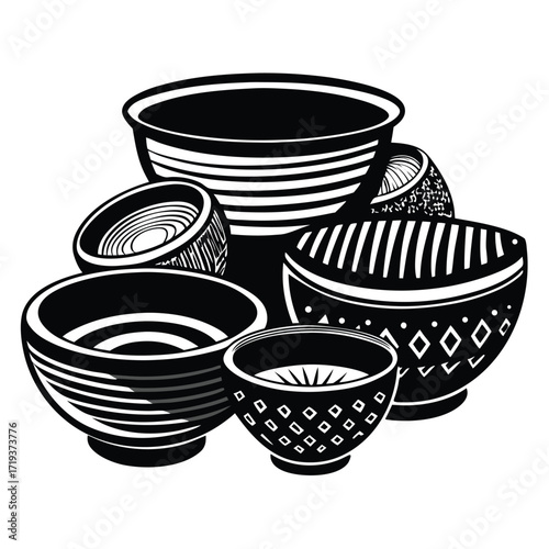A monochrome composition showcases assorted decorative bowls arranged artistically against a stark, clean white background