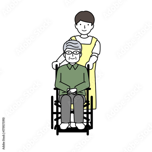 高齢者の車椅子を介助する介護士