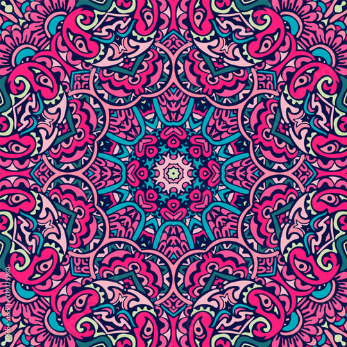 Vibrant and intricate psychedelic mandala pattern in pink, magenta, and teal hues with a symmetrical, floral-like design.