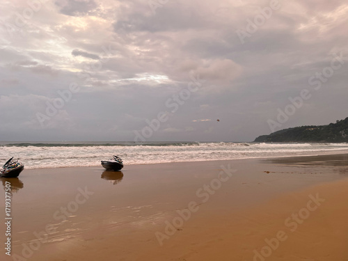 Jet skis on the beach at sunset, Phuket, Thailand.