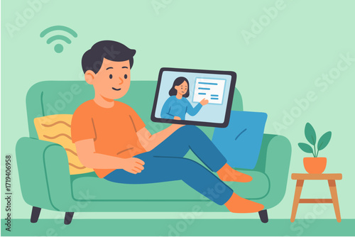 Man Relaxing on Sofa Watching Online Tutorial on Tablet