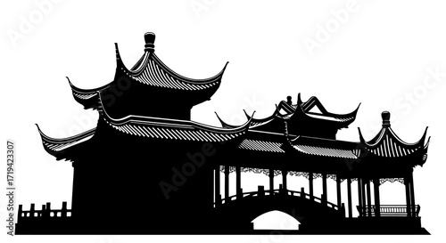 Silhouette of traditional Chinese pagoda architecture with a bridge